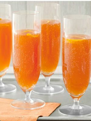 Orangen-Kirsch-Champagner-Cocktails